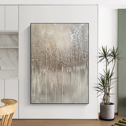 Large contemporary hand-painted abstract artwork featuring a monochromatic gray palette with drips and metallic silver accents evoking winter landscapes. DLZ1517