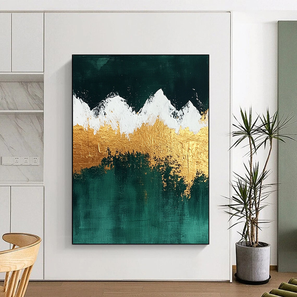 Contemporary hand-painted abstract art featuring gold and emerald green mountains with white snow enhanced by gold foil and textured surfaces. DLZ1321