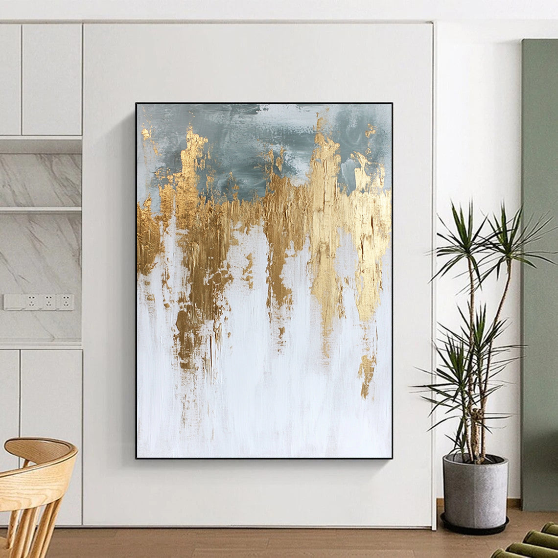 Contemporary hand-painted abstract artwork in white and gold featuring textured paint surface and elegant gold foil accents. DLZ0686