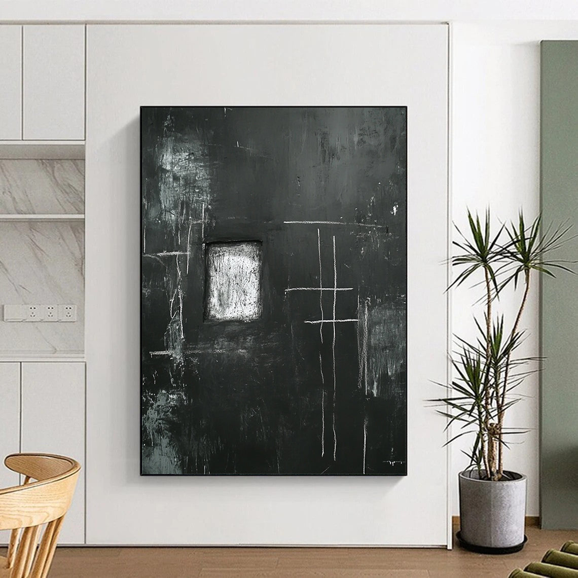 Contemporary abstract art featuring a black wall with eerie white chalk drawings of a cross and window with a central space for personal expression. DLZ1150