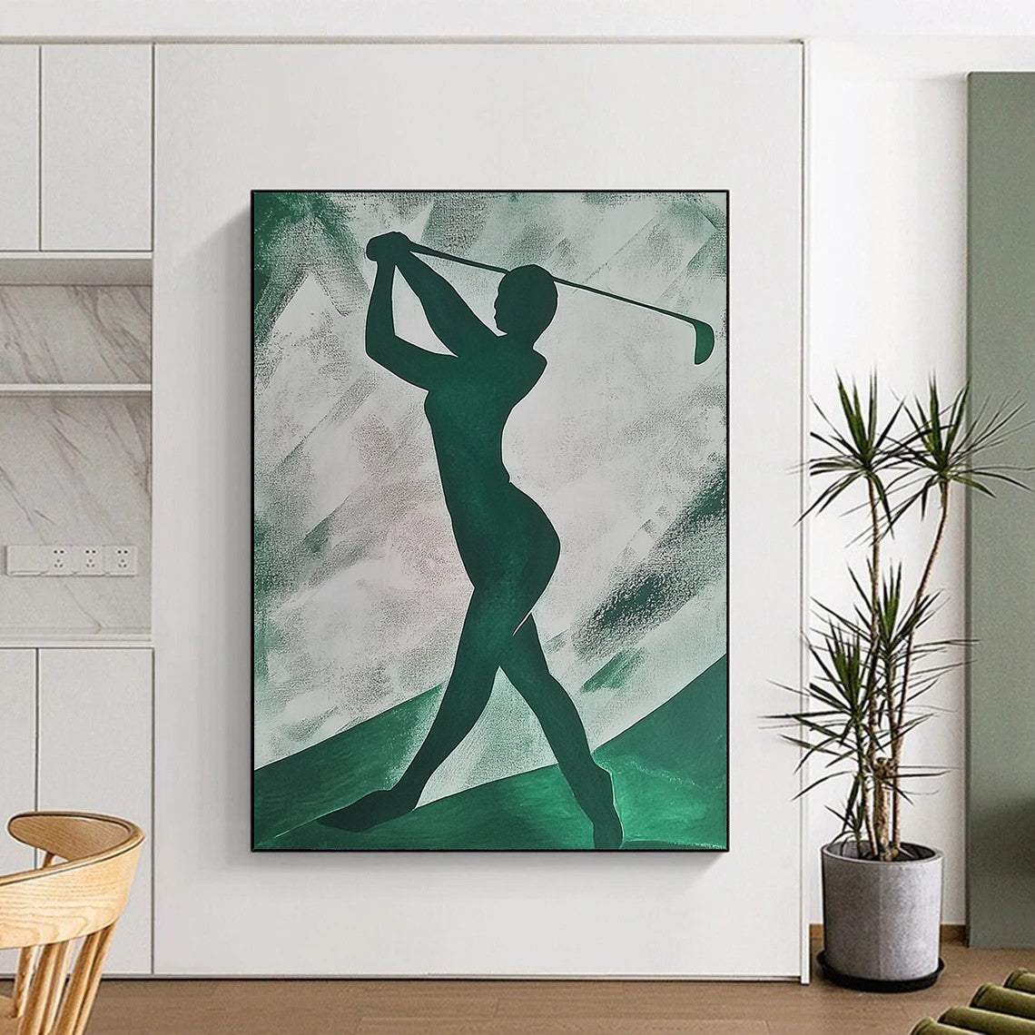 Contemporary abstract painting featuring an emerald green silhouette of a woman playing golf on textured paper with simple shapes. DLZ1406
