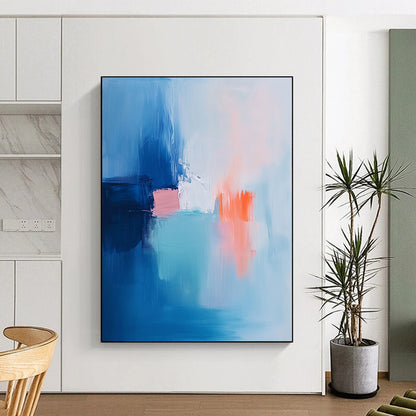 Contemporary hand-painted abstract art featuring soft brush strokes in light blue pink and white with navy blue and orange accents. DLZ1053