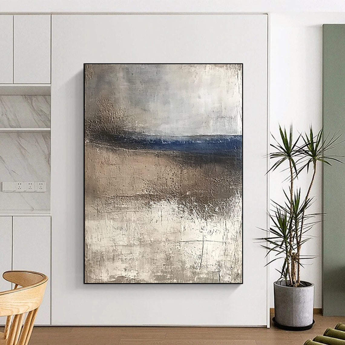 Contemporary abstract artwork featuring textured canvas with weathered hues of blue and brown evoking serene coastal landscapes and tranquility in a minimalist style. DLZ0445