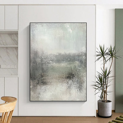 Large contemporary abstract painting featuring soft gray and subtle green hues, textured canvas evokes tranquility and nostalgia in a serene landscape. DLZ0871