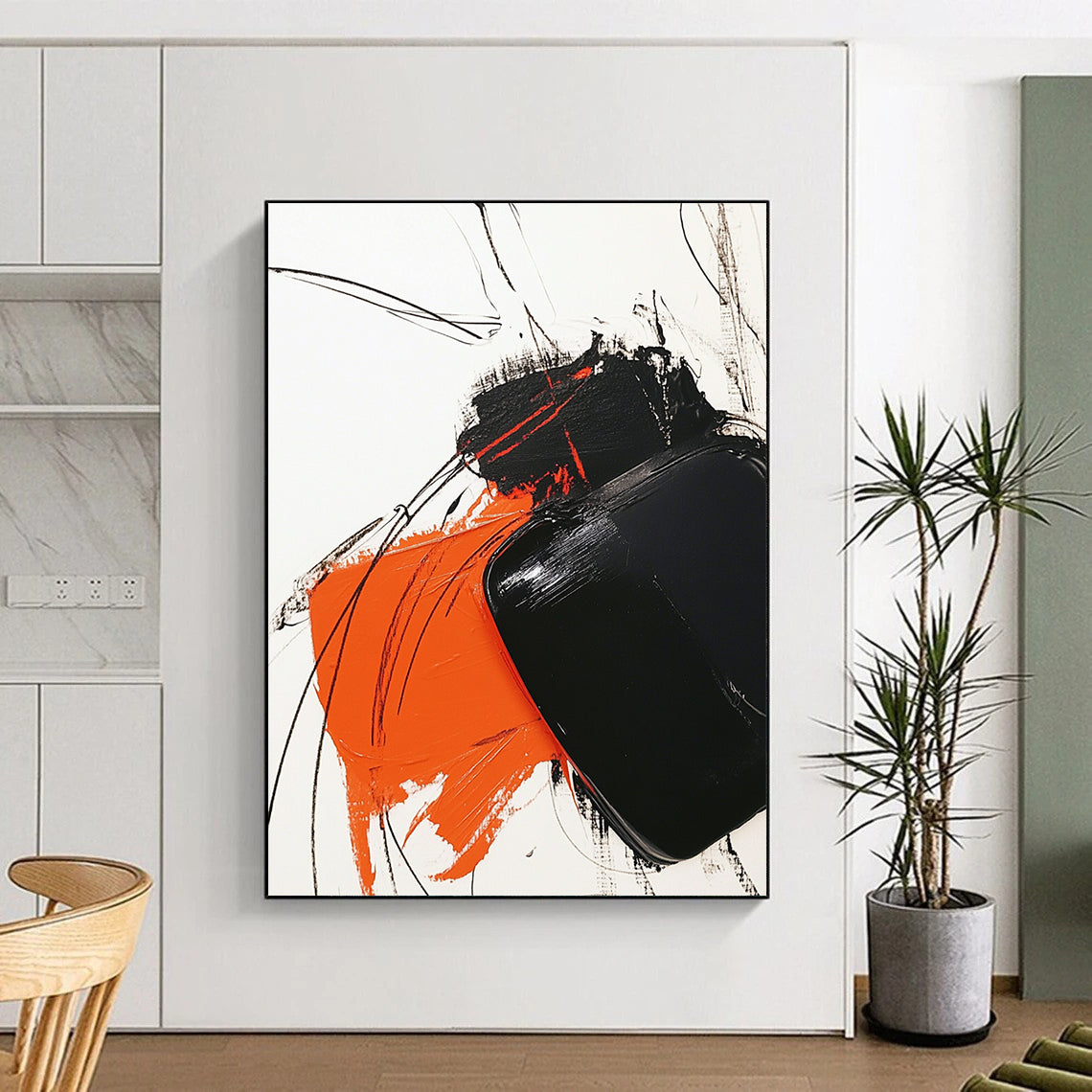 Contemporary abstract artwork features bold black and orange strokes on white, complemented by minimalistic line drawings for striking contrast. DLZ1537