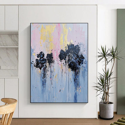 Contemporary hand-painted abstract artwork featuring textured black flowers in an urban setting with pale pink and blue tones and gold leaf accents. DLZ0477