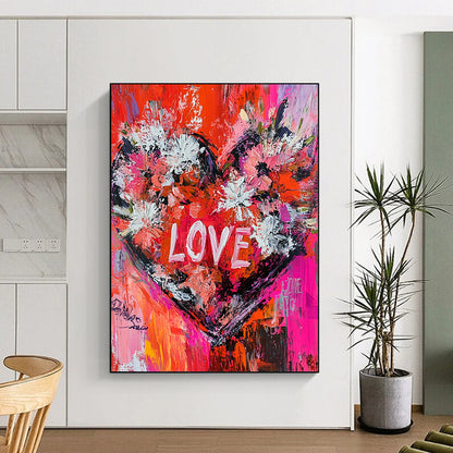 Vibrant contemporary abstract painting featuring oversized floral heart and dynamic brushstrokes with engaging text LOVE in bold reds pinks and whites. DLZ1494
