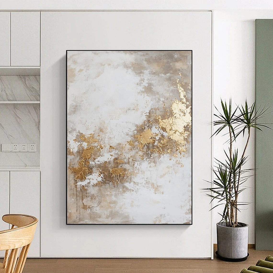 Contemporary hand-painted abstract artwork featuring dynamic paint splatters and luxurious gold foil accents against a backdrop of beige and grey hues. DLZ0534