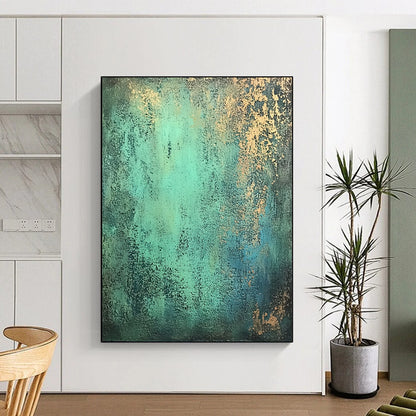 Contemporary hand-painted abstract art features textured patina-green with hints of blue and gold on a dark gray background for a rustic yet elegant ambiance. DLZ1165