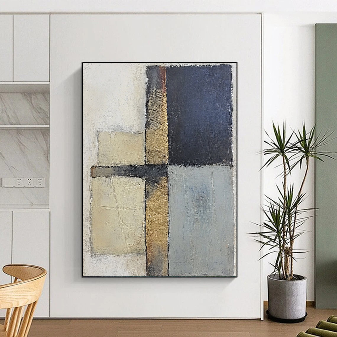 Contemporary abstract painting featuring textured gray and blue squares with serene beige tones on canvas creating a calm and balanced atmosphere. DLZ0983