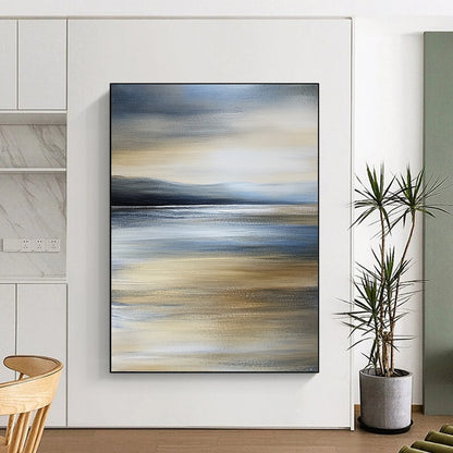 Contemporary hand-painted abstract art captures a tranquil beach scene with calm sea and an overcast sky in soothing shades of grey and blue. DLZ0999