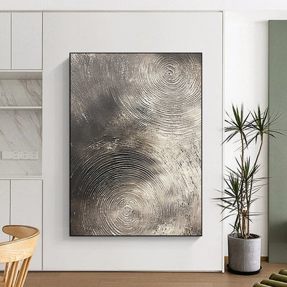 Contemporary abstract artwork features silver textures with swirling patterns on a dark gray background emphasizing depth and movement. DLZ1075