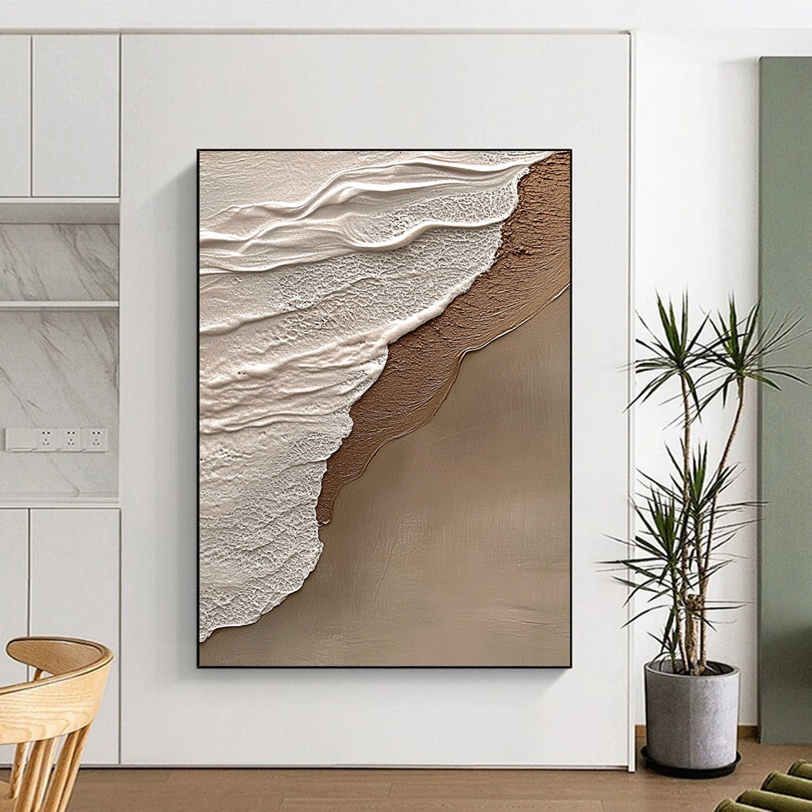 Contemporary hand-painted abstract art features beige and gray tones, evoking tranquility and harmony with a natural beach scene in the background. DLZ1212