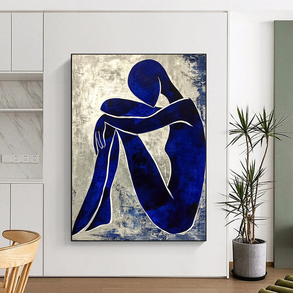 Contemporary abstract painting featuring a textured blue figure with crossed legs and hands on knees enhanced by white contour lines in the style of Matisse. DLZ0361