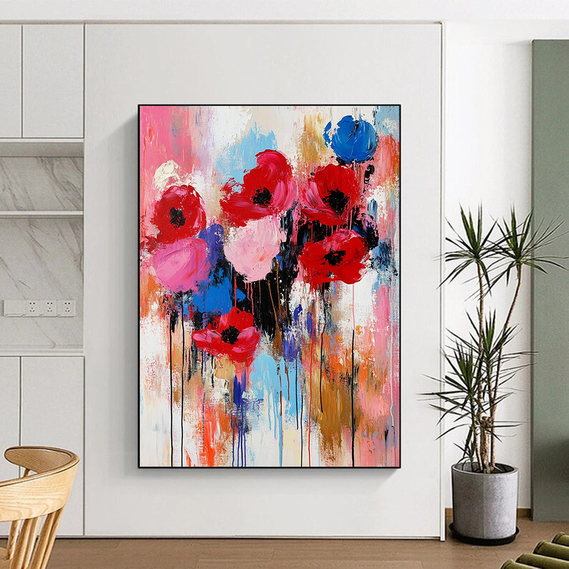 Expressive contemporary abstract painting of flowers in vibrant red pink and blue with thick brushstrokes and texture capturing the warmth of springtime. DLZ0982
