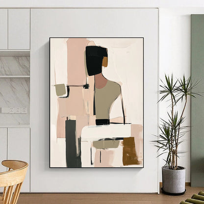 Contemporary handmade abstract art featuring muted beige black and white tones with soft pink and green hints and loose shapes around a visible table. DLZ0912