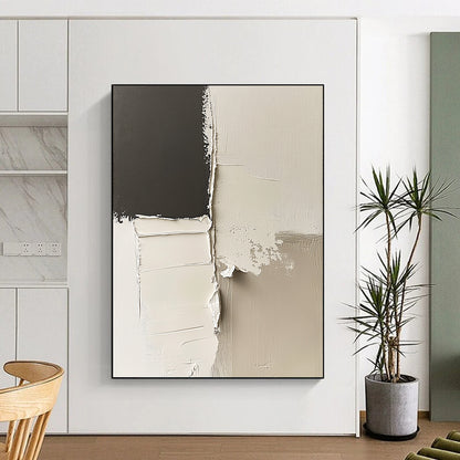 Contemporary abstract artwork features striking black and white impasto shapes and minimalist lines on a canvas with deconstructed paper elements in neutral tones. DLZ0524