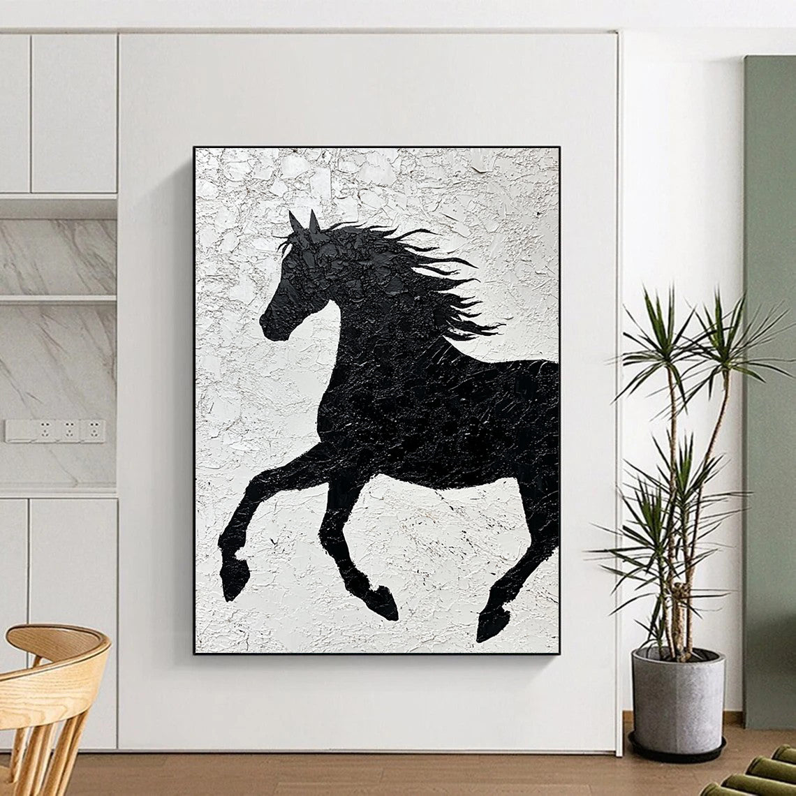 Contemporary abstract painting featuring a textured black horse silhouette on white paper emphasizing strength and freedom through impasto technique and expressive brushstrokes. DLZ1462