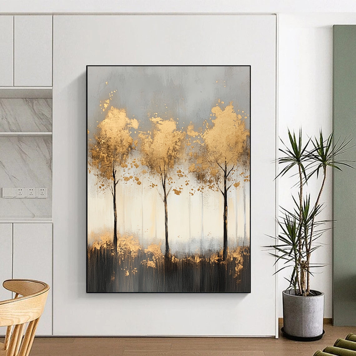 Contemporary abstract painting features misty landscape with light gray and gold tones, delicate tree shapes, and shimmering golden foil accents for a serene ambiance. DLZ1352