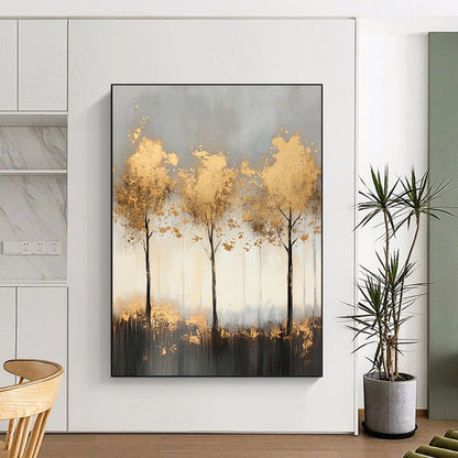 Contemporary abstract painting features misty landscape with light gray and gold tones, delicate tree shapes, and shimmering golden foil accents for a serene ambiance. DLZ1352