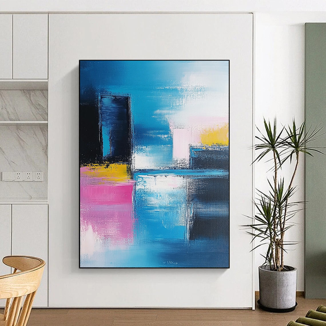 Modern abstract artwork features vibrant blue and pink brushstrokes, showcasing a contemporary cityscape against a soft sky and serene sea. DLZ0348