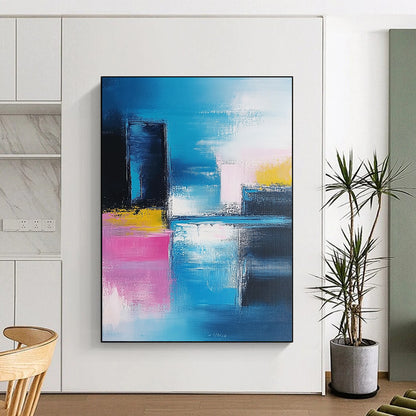 Modern abstract artwork features vibrant blue and pink brushstrokes, showcasing a contemporary cityscape against a soft sky and serene sea. DLZ0348