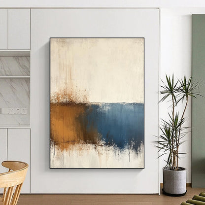 Contemporary hand-painted abstract art features beige and blue tones on a textured white background with minimalist soft edges and subtle brown accents. DLZ0725
