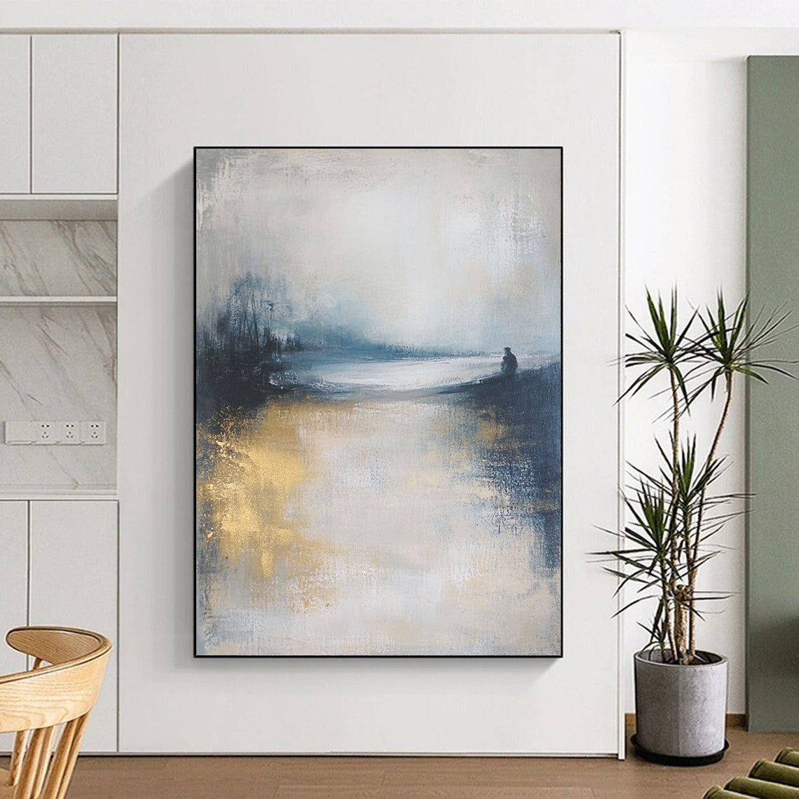 Contemporary abstract art featuring a moody ocean landscape in soft focus, neutral tones enhanced by gold and blue, creating a serene atmosphere. DLZ0464