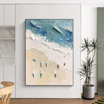 Large contemporary abstract artwork featuring vibrant acrylic colors capturing surfers in motion against a white sand beach backdrop in soft blues and greens. DLZ0842